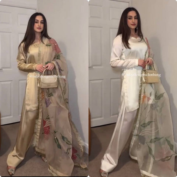 "Grace in Gold & Ivory: Floral Elegance in Traditional Attire"