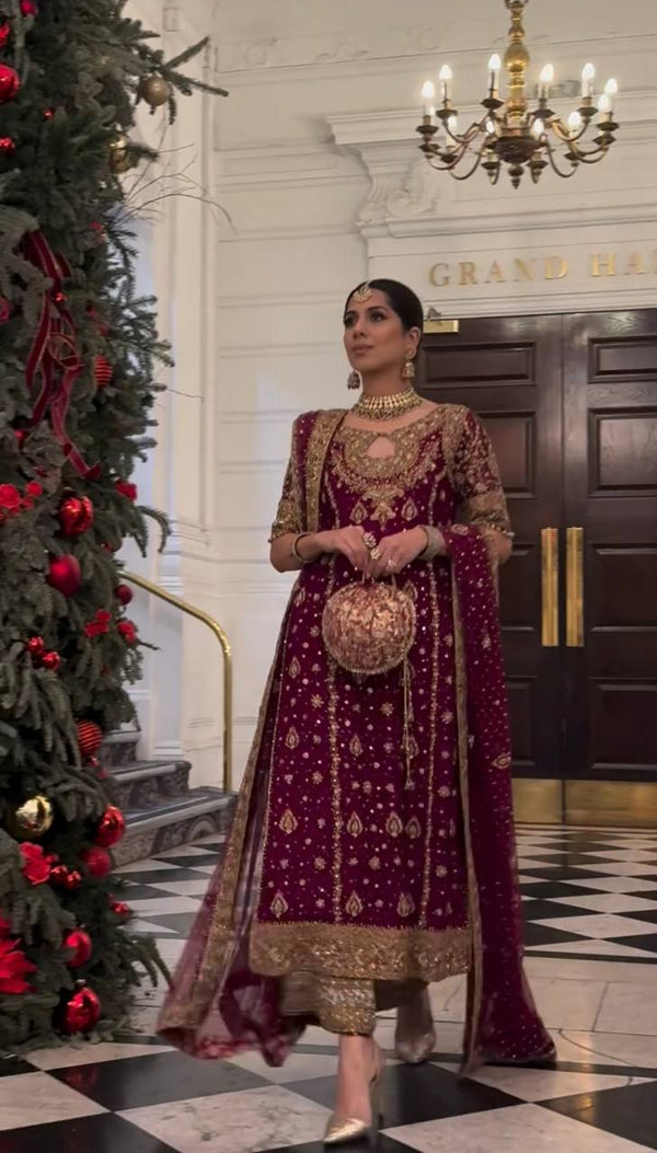 Royal Plum Elegance: Festive Look with Heavy Embroidery and Luxe Traditional Accessories