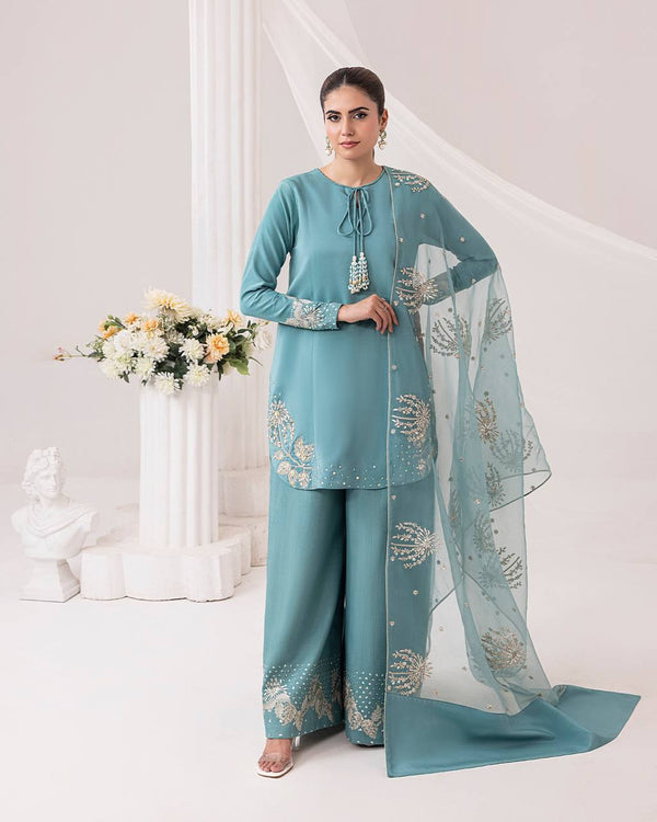 Teal Elegance: Embellished Suit with Sheer Dupatta and Graceful Traditional Charm