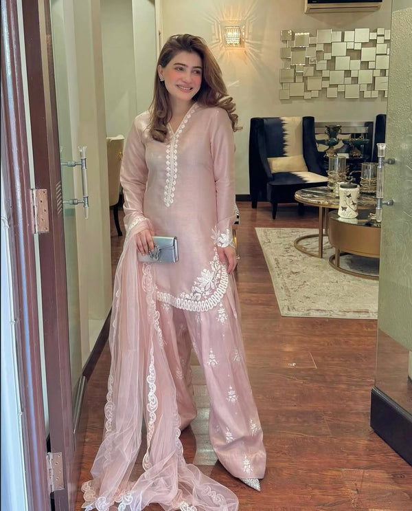 Chic Confidence: Embracing Style and Grace in a Striking Pink Ensemble