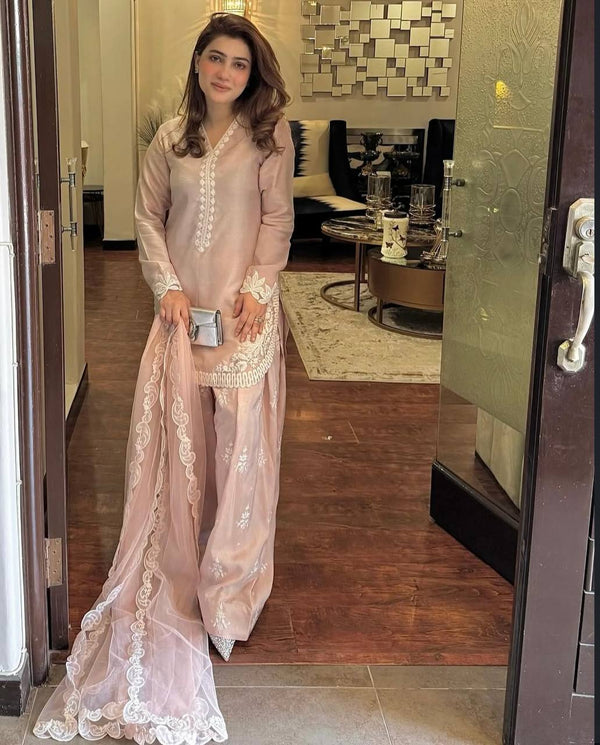 Chic Confidence: Embracing Style and Grace in a Striking Pink Ensemble