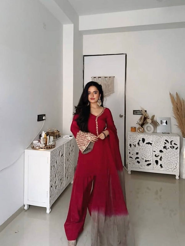 Elegant Brown Traditional Outfit with Orange Dupatta, Embellished Sleeves, and Gold Jewelry Ensemble