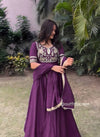 Graceful Serenity: Woman in Purple Embracing Nature kf