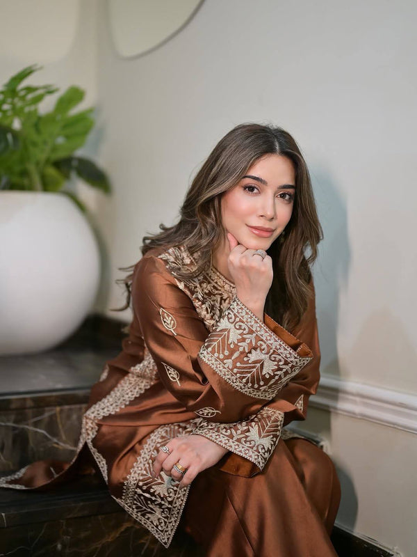 legance in Earth Tones: A Serene Moment on the Steps