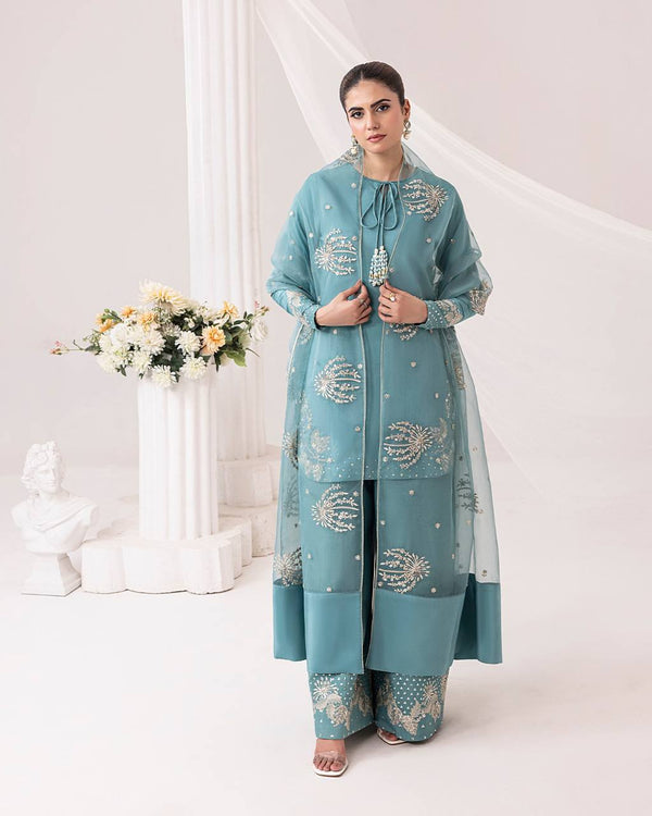 Teal Elegance: Embellished Suit with Sheer Dupatta and Graceful Traditional Charm