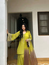 Elegant Brown Traditional Outfit with Orange Dupatta, Embellished Sleeves, and Gold Jewelry Ensemble