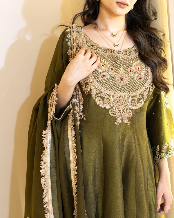 Timeless Grace: Woman in Green Dress Radiates Captivating Charm